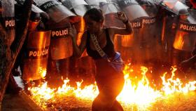 Tras el fraude electoral, en Venezuela comenzaron protestas como esta en Puerto La Cruz.