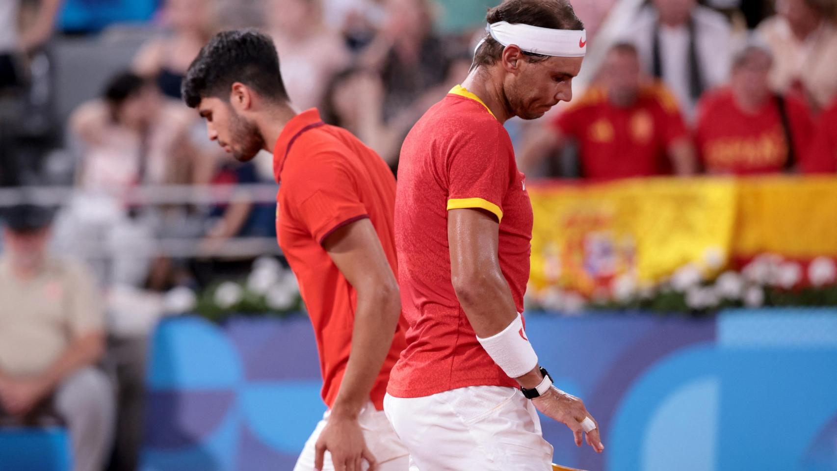 Carlos Alcaraz y Rafa Nadal, durante el partido ante la pareja estadounidense.