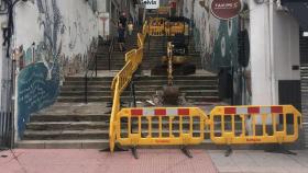 Obras, esta mañana, en la escalinata entre Adelaida Muro y Ángel Rebollo.