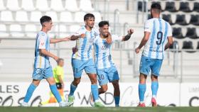 Los jugadores del Málaga CF celebran un gol en la pretemporada