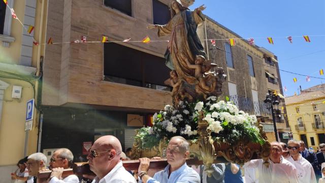 La procesión y ofrenda floral en las fiestas de Guijuelo