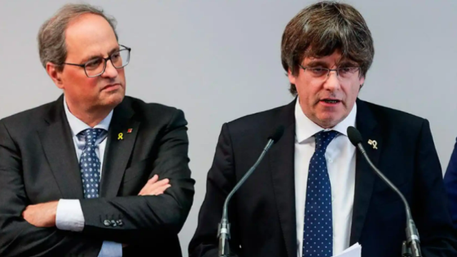 Los expresidentes de la Generalitat de Cataluña Quim Torra y Carles Puigdemont en una imagen de archivo.