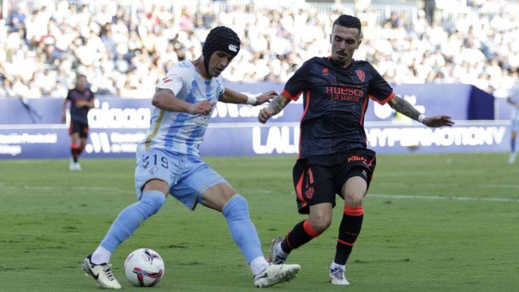 Luismi y Joaquín Muñoz en el Málaga CF vs. Huesca