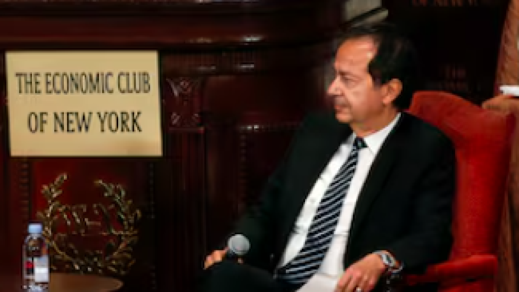 Donald Trump y John Paulson en una conferencia en Nueva York.