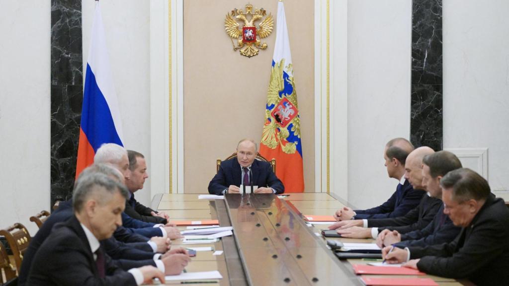 Russian President Vladimir Putin chairs a meeting of the Security Council.