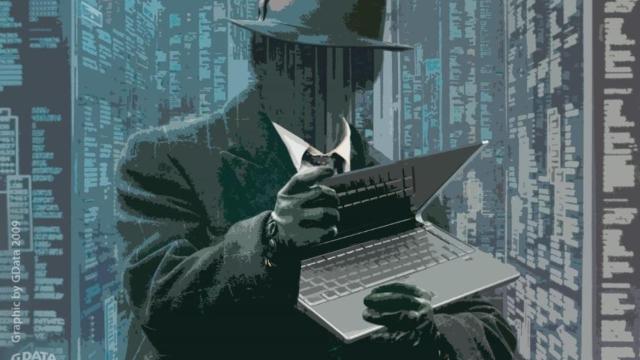 Ilustración de un ciberataque con la imagen de un 'hacker' sujetando un ordenador.