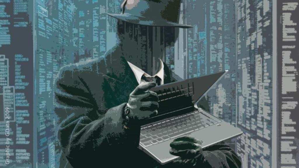 Ilustración de un ciberataque con la imagen de un 'hacker' sujetando un ordenador.