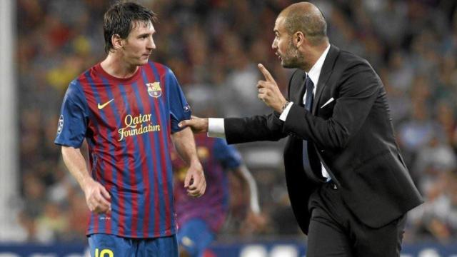 Pep Guardiola, con Leo Messi.