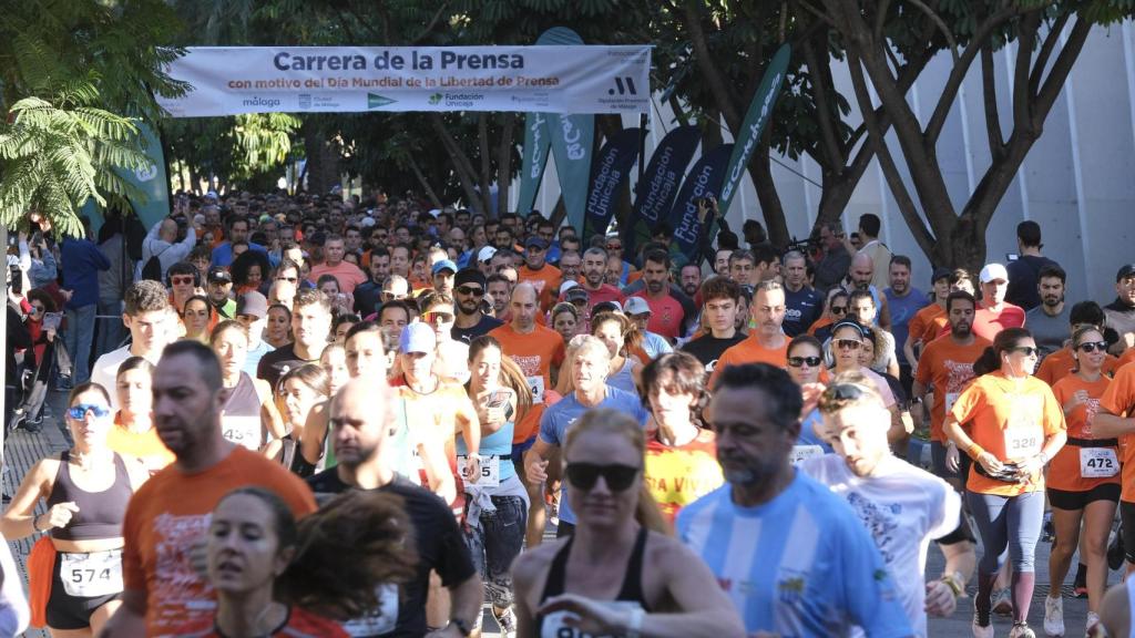 Más de un millar de participantes en la carrera de la prensa, en Málaga.