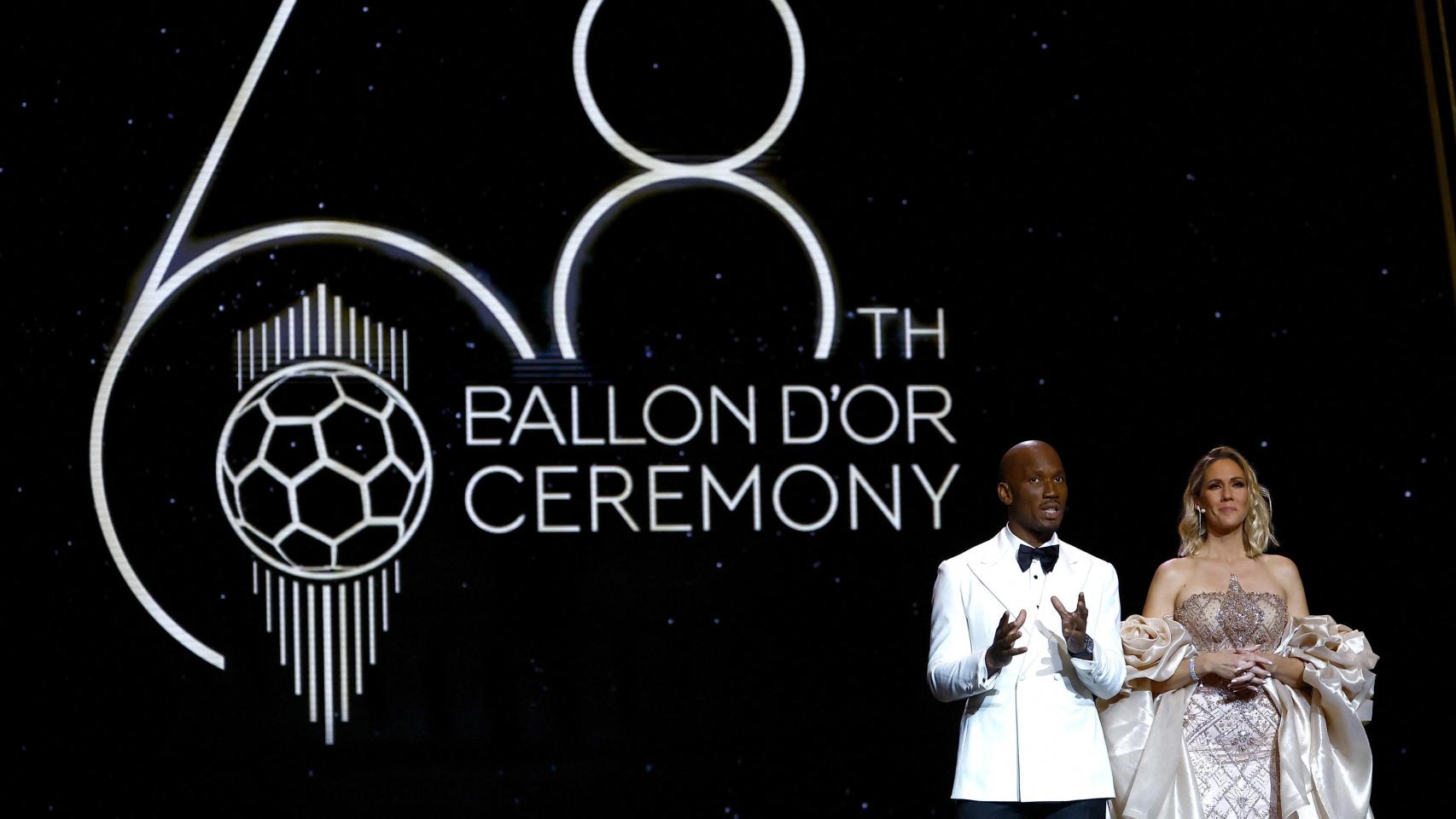 Didier Drogba y Sandy Heribert, presentando la Gala del Balón de Oro