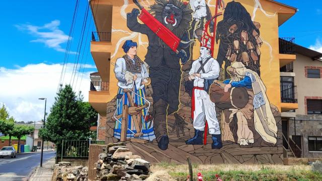 Mural gigante sobre Los Carochos pintado por el artista Carlos Adeva