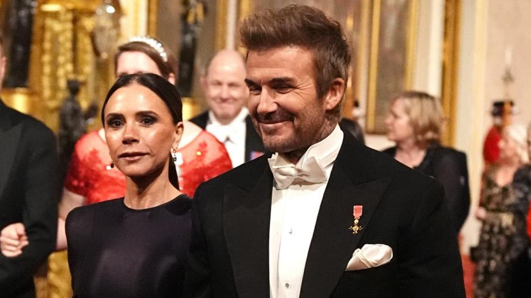 David y Victoria Beckham en su visita al Palacio de Buckingham el pasado 3 de diciembre.