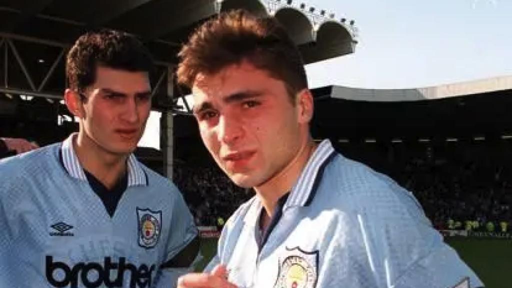 Mikhail Kavelashvili, left, with his compatriot Georgi Kinkladze at Manchester City