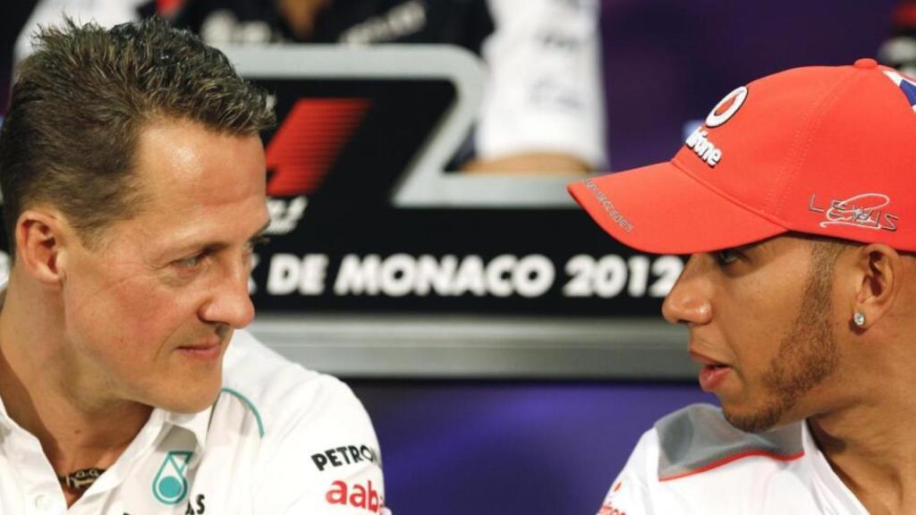 Michael Schumacher y Lewis Hamilton, durante una rueda de prensa en el GP de Monaco 2012