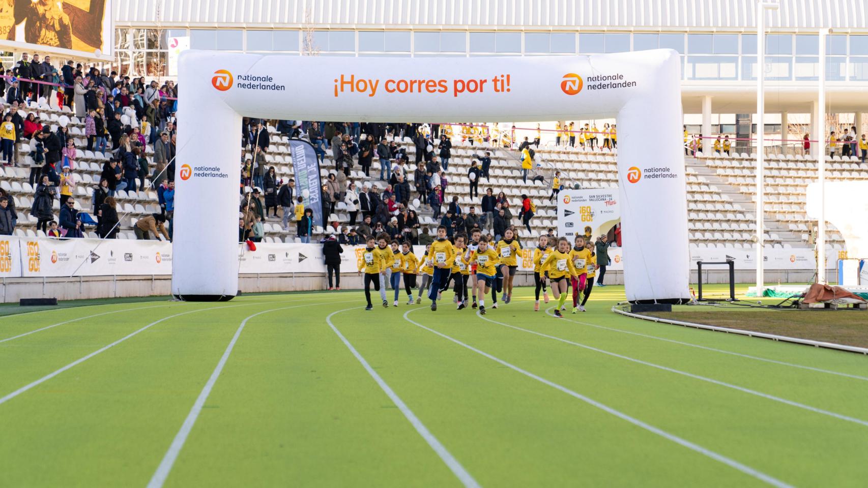 Niños participando en la décima edición de la Nationale-Nederlanden San Silvestre Vallecana Mini