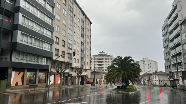 Calles mojadas en A Coruña este domingo.