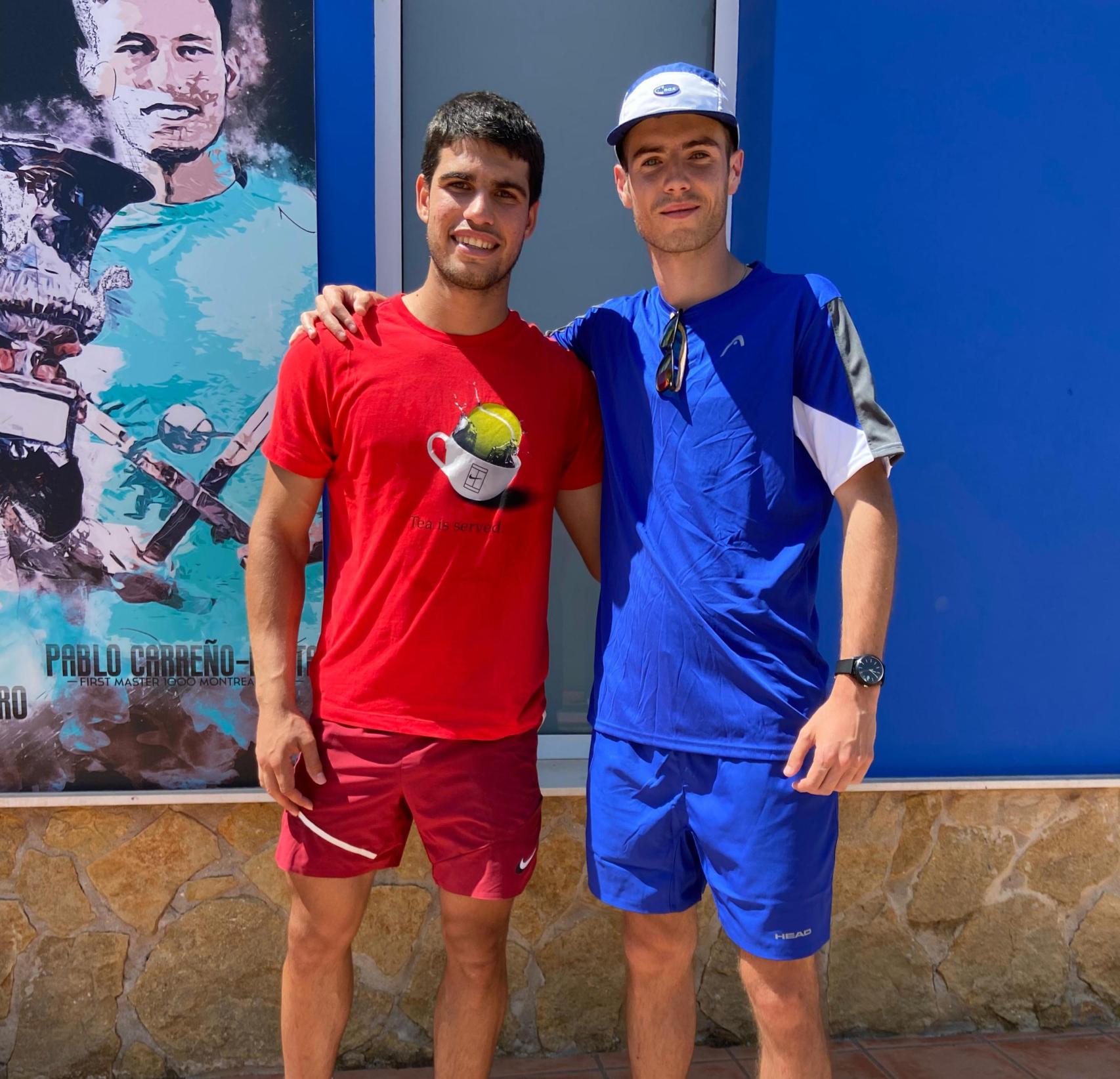 Juan Ruiz junto a Carlos Alcaraz.