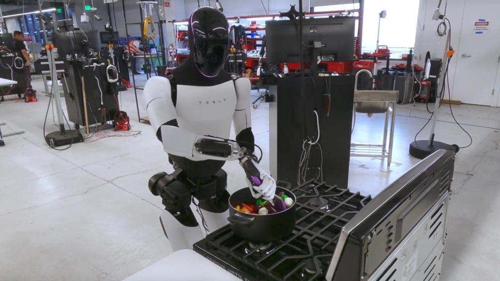 El robot Optimus de Tesla cocinando.
