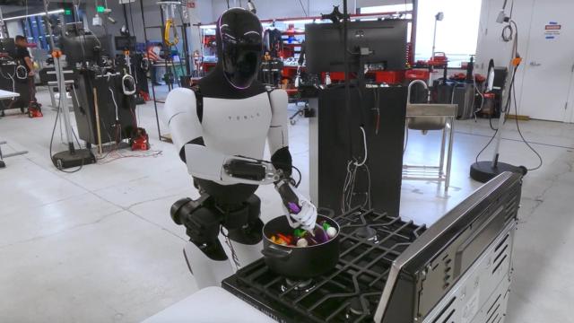 El robot Optimus de Tesla cocinando.