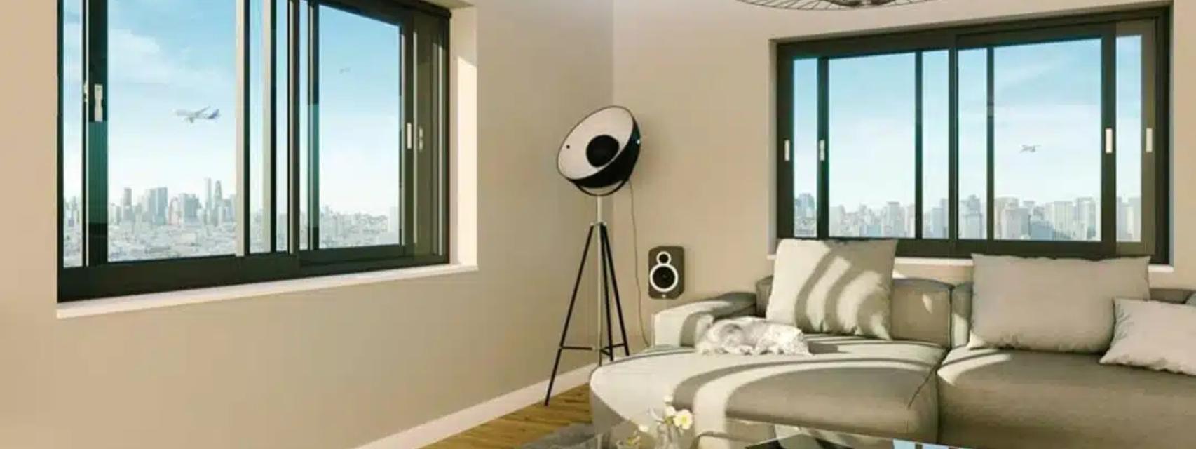 Un salón con las ventanas climáticas de Technal.