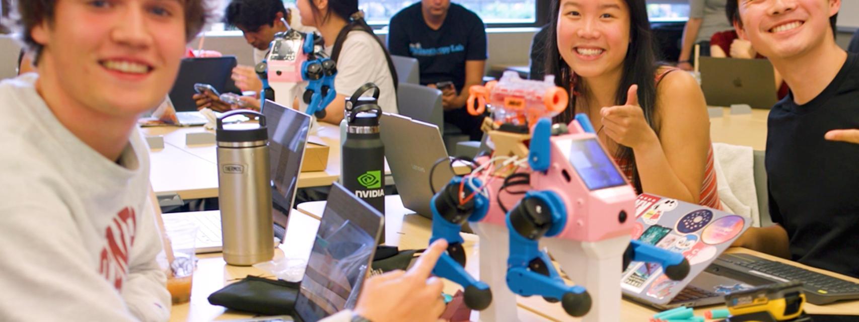 Los estudiantes con Pupper, su perro robot 'bombero'.