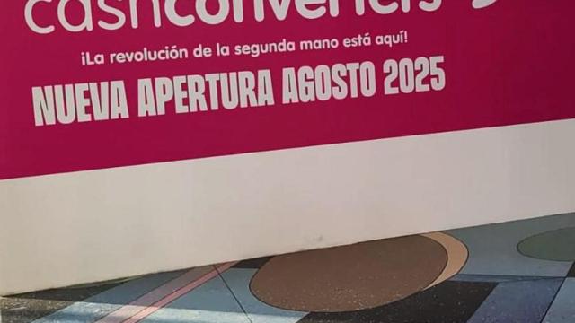 Cartel anunciador de la apertura de la tienda en el centro comercial de Toledo.